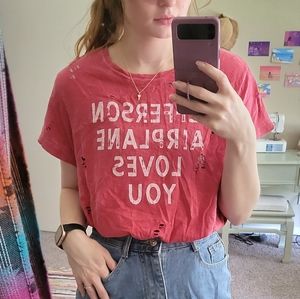 Graphic, distressed tee.